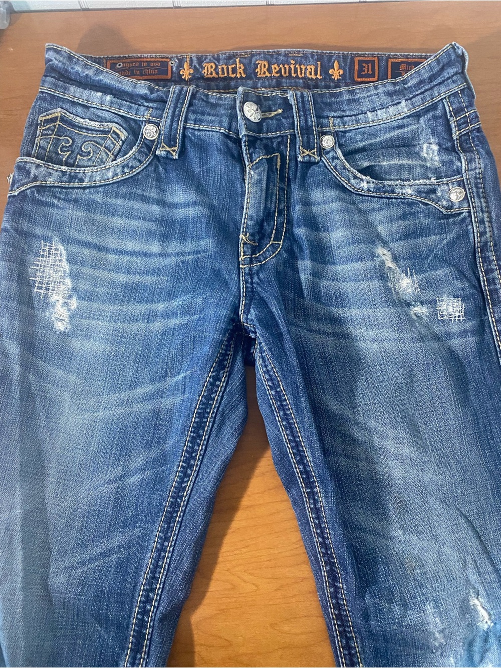 Rock Revival Women's Faded Blue Skinny Jeans with Distressed Detail